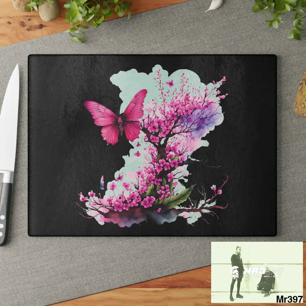 Pink Butterfly on Ornamental cherry tree branch Cutting Board Home Decor