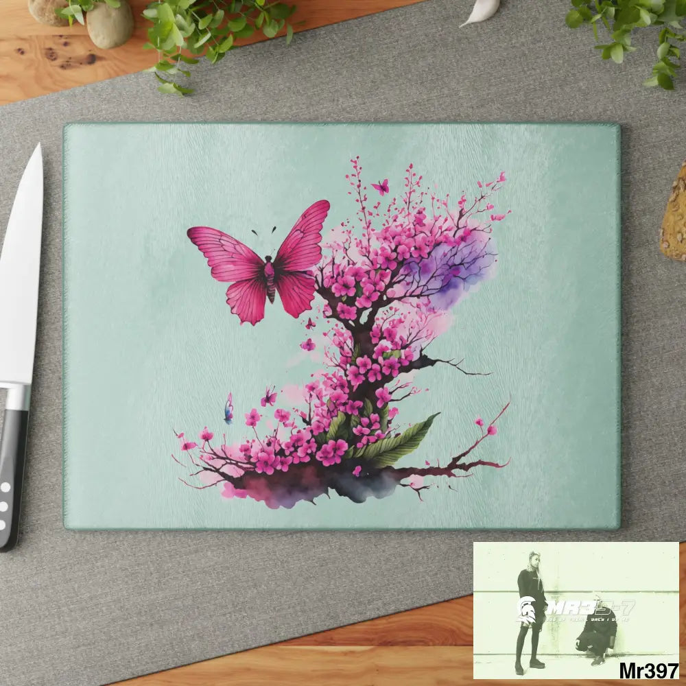 Pink Butterfly on Ornemental cherry tree branch Cutting Board Home Decor