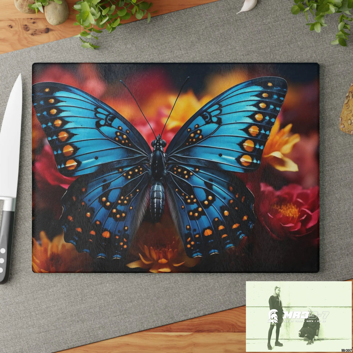 Blue Butterfly on flower with Black and Orange Spots Glass Cutting Board Home Decor