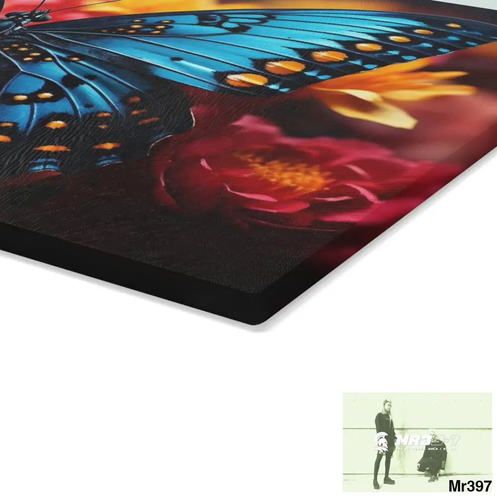 Blue Butterfly on flower with Black and Orange Spots Glass Cutting Board Home Decor