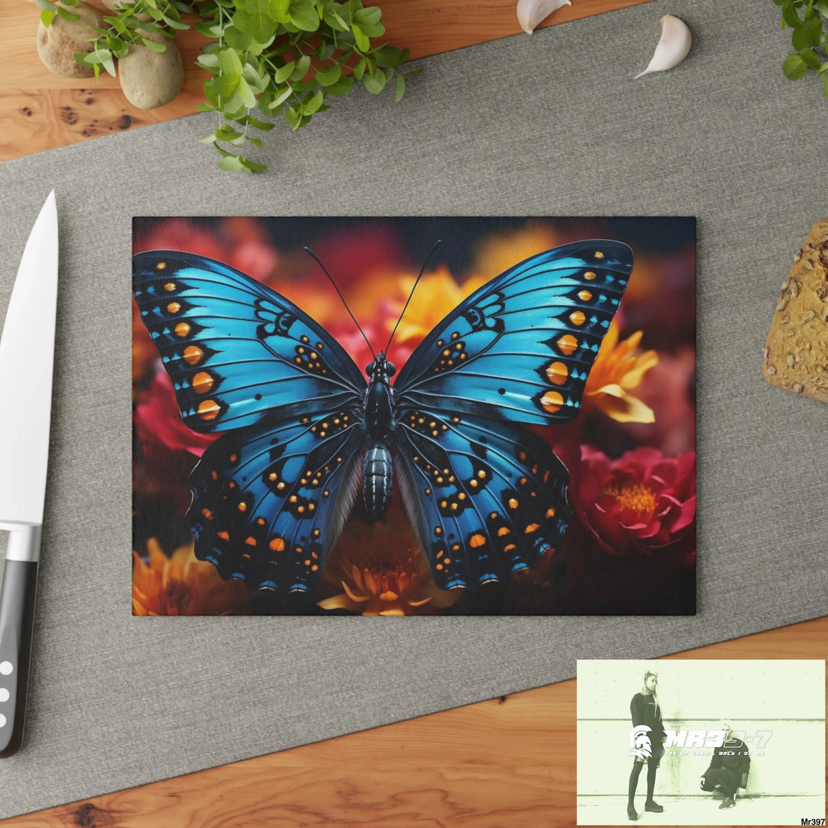 Blue Butterfly on flower with Black and Orange Spots Glass Cutting Board Home Decor
