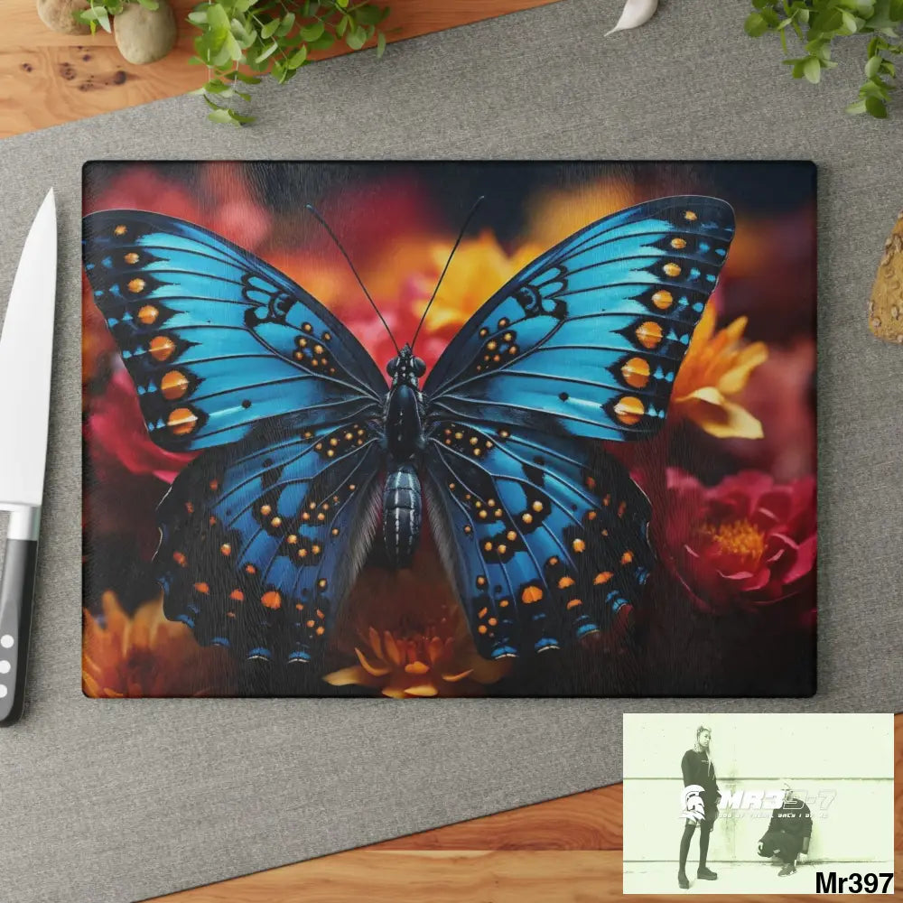 Blue Butterfly on flower with Black and Orange Spots Glass Cutting Board Home Decor