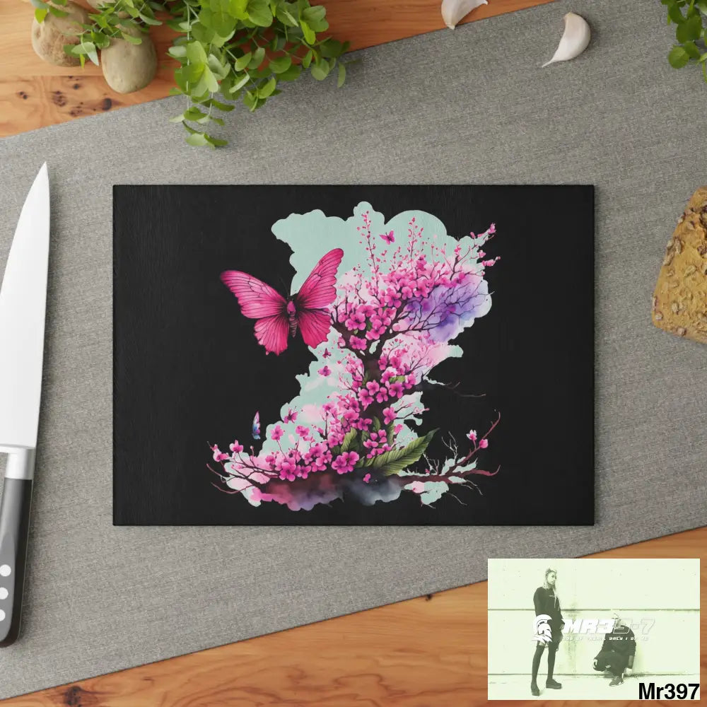 Pink Butterfly on Ornamental cherry tree branch Cutting Board Home Decor
