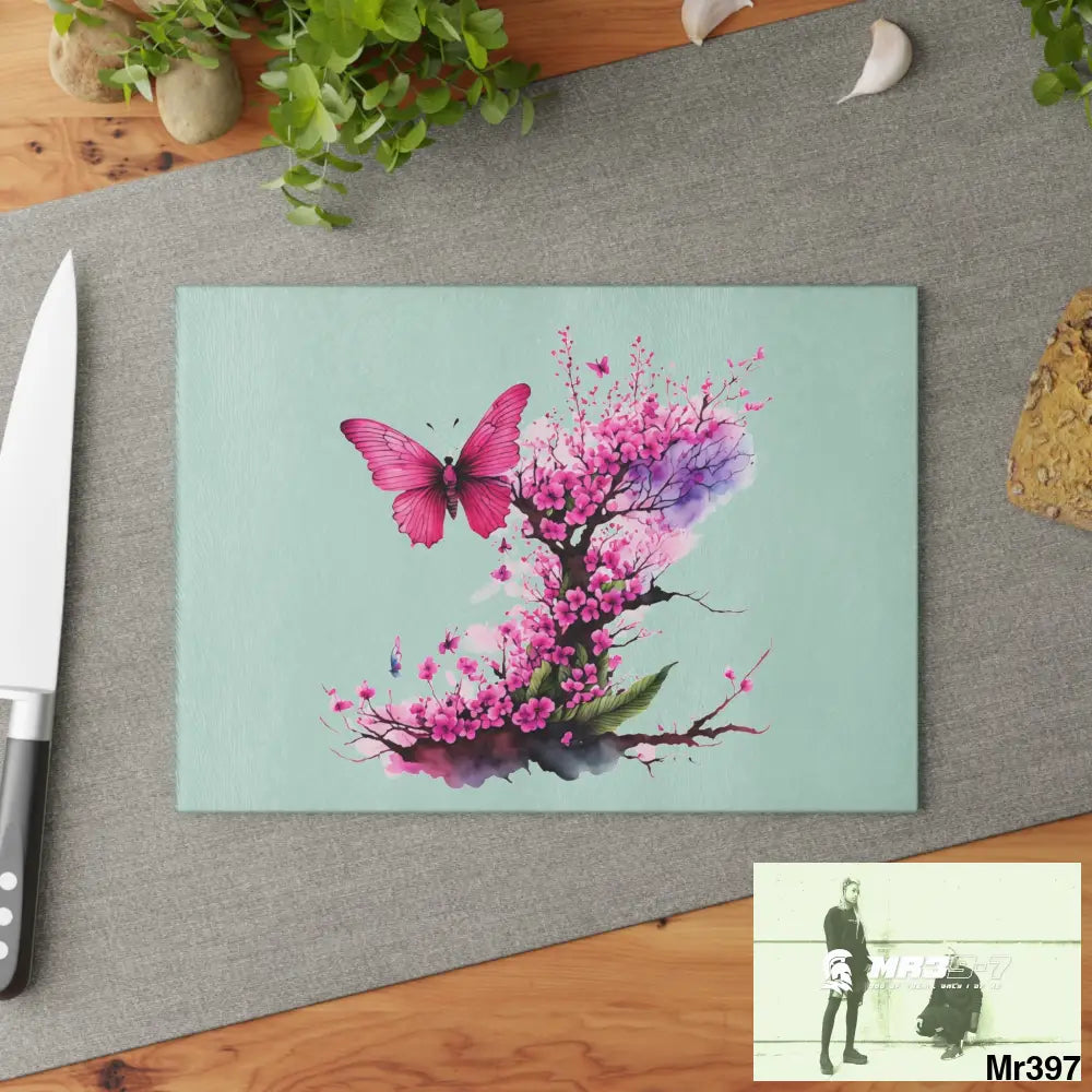 Pink Butterfly on Ornemental cherry tree branch Cutting Board Home Decor