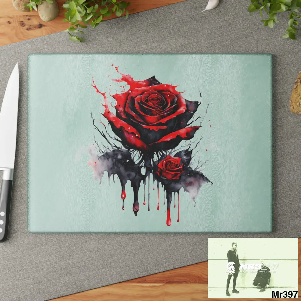 Red Rose with blood drippings on black abstract background Cutting Board Home Decor